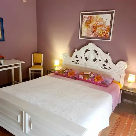 V.home Casa de hóspedes